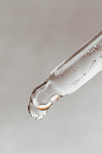 Glycolic Acid Vs Salicylic Acid: Which is Better? 4 dropper of clear liquid